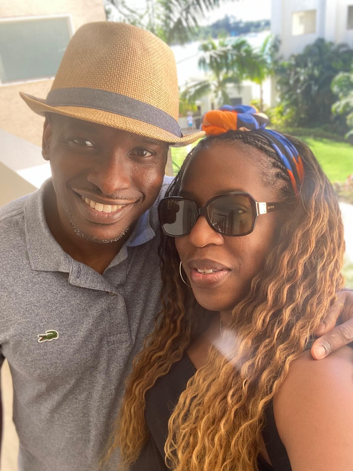 Kola and his wife, Ade, smiling together
